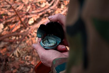 Navigation: A military lensatic compass is the best choice and most expensive.