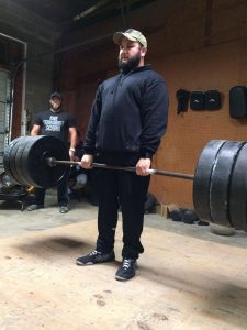 Jarrad_executes_the_deadlift_at_the_Fight_Strong_class